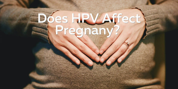 pregnant woman making hands heart